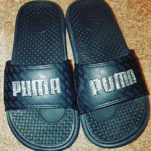 Customized Black Pumas size 7